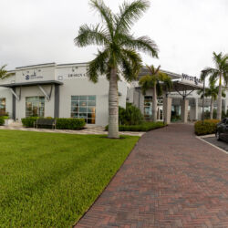 West Lake Sales center with car parked out in front.