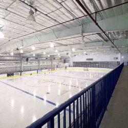 Inside a hockey ice rink.