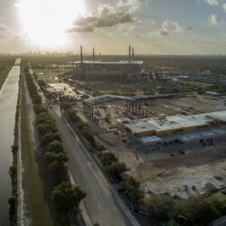 Sunset over construction site.